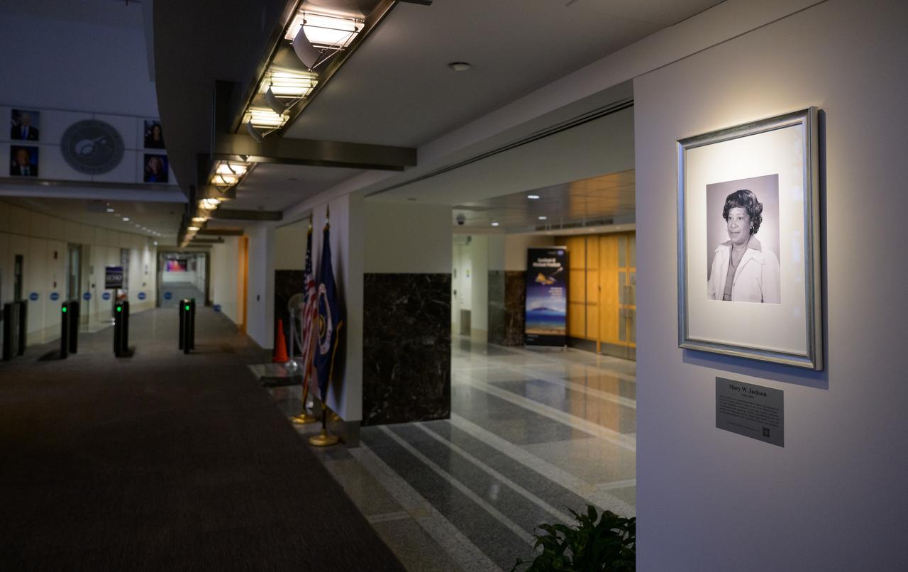 A portrait of Mary W. Jackson is seen after it was unveiled, Friday, Dec. 6, 2024, at the NASA Headquarters Mary W. Jackson Building in Washington. Mary W. Jackson was a pioneering aerospace engineer and mathematician at NASA’s Langley Research Center. As one of the “Hidden Figures,” she made significant contributions to the space program, particularly in aerodynamics and engineering. Jackson’s groundbreaking work and advocacy for women and minorities helped shape NASA’s success and advance opportunities for future generations in science and technology. Photo Credit: (NASA/Joel Kowsky)