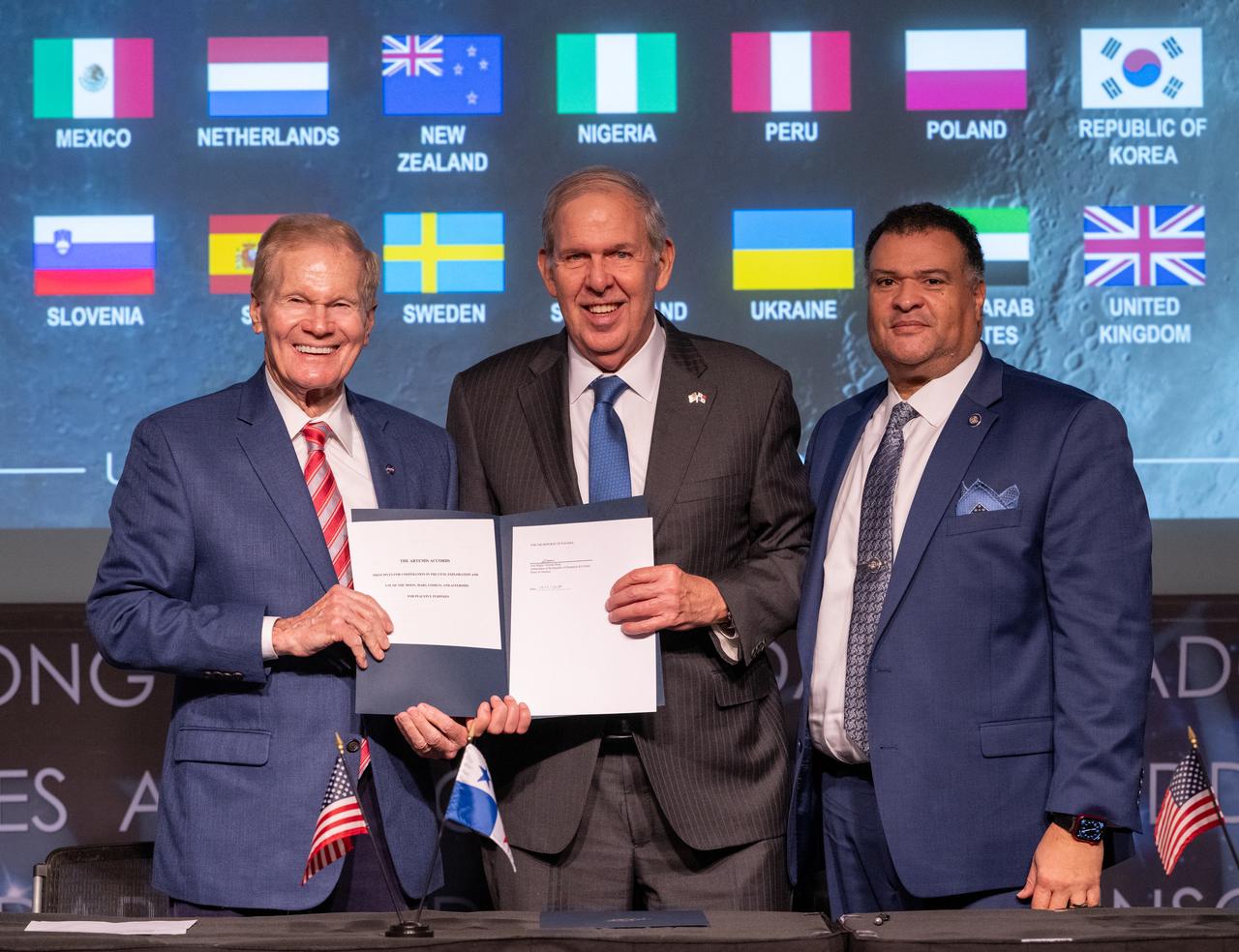 NASA Administrator Bill Nelson, left, Ambassador of the Republic of Panama to the United States of America José Miguel Alemán Healy, center, and U.S. Department of State Principal Deputy Assistant Secretary in the Bureau of Oceans and International Environmental and Scientific Affairs Tony Fernandes, pose for a picture after the Republic of Panama signed the Artemis Accords, Wednesday, Dec. 11, 2024, at the Mary W. Jackson NASA Headquarters building in Washington. The Republic of Panama is the 49th country to sign the Artemis Accords, which establish a practical set of principles to guide space exploration cooperation among nations participating in NASA’s Artemis program. Photo Credit: (NASA/Joel Kowsky)