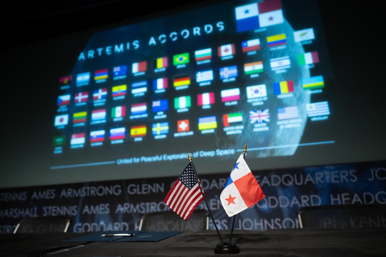 The flags of the Republic of Panama and the United States are seen ahead of the signing of the Artemis Accords, Wednesday, Dec. 11, 2024, at the Mary W. Jackson NASA Headquarters building in Washington. The Republic of Panama is the 49th country to sign the Artemis Accords, which establish a practical set of principles to guide space exploration cooperation among nations participating in NASA’s Artemis program. Photo Credit: (NASA/Joel Kowsky)