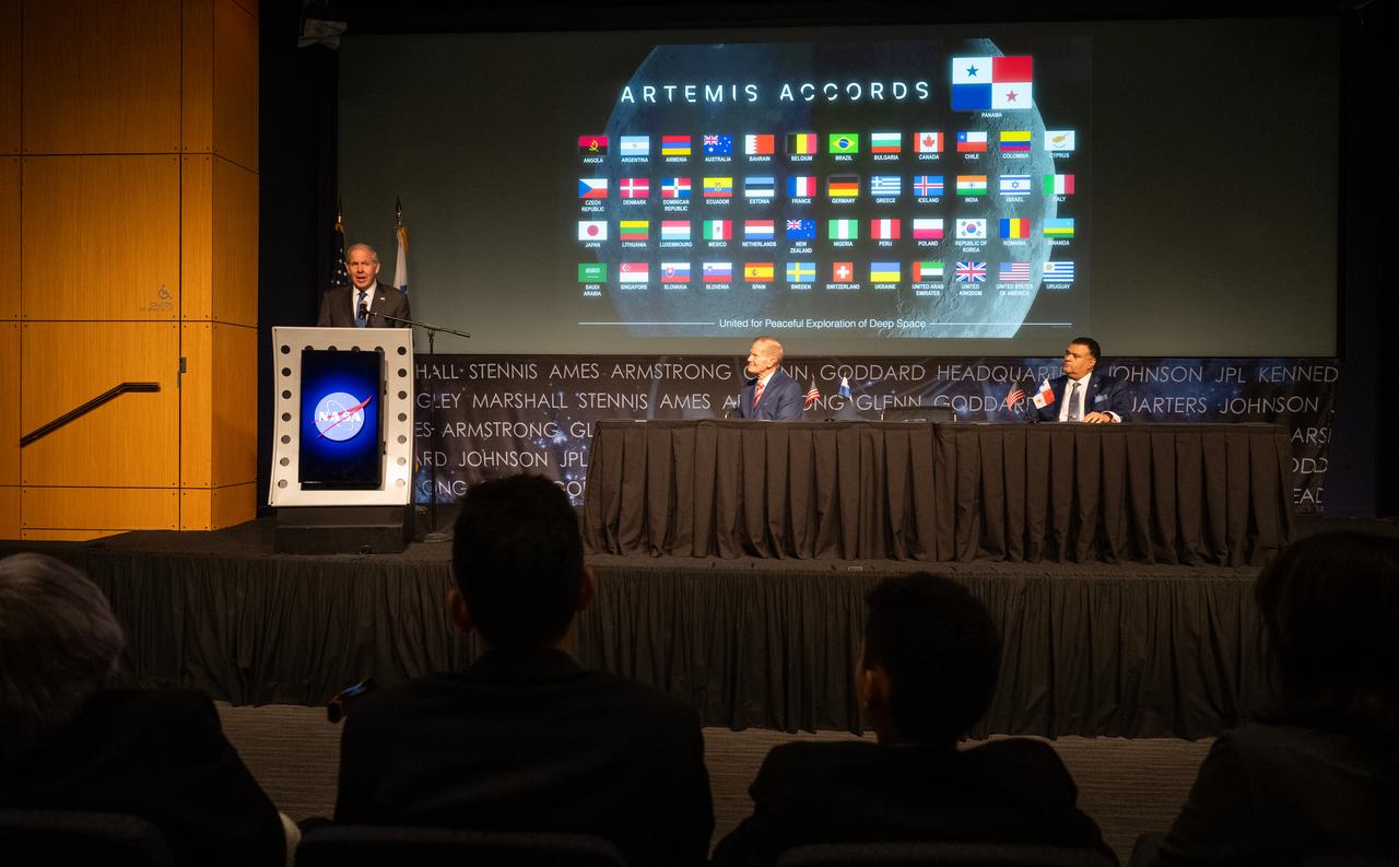 Ambassador of the Republic of Panama to the United States of America José Miguel Alemán, left, delivers remarks as NASA Administrator Bill Nelson, and U.S. Department of State Principal Deputy Assistant Secretary in the Bureau of Oceans and International Environmental and Scientific Affairs Tony Fernandes look on during an Artemis Accords signing ceremony, Wednesday, Dec. 11, 2024, at the Mary W. Jackson NASA Headquarters building in Washington. The Republic of Armenia is the 49th country to sign the Artemis Accords, which establish a practical set of principles to guide space exploration cooperation among nations participating in NASA’s Artemis program. Photo Credit: (NASA/Joel Kowsky)