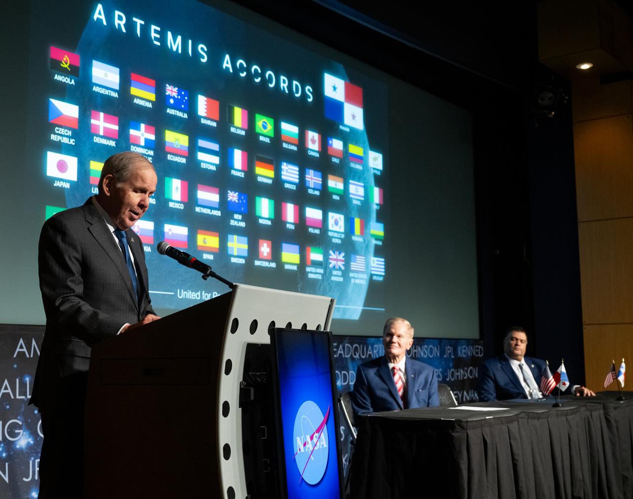 Ambassador of the Republic of Panama to the United States of America José Miguel Alemán delivers remarks as NASA Administrator Bill Nelson, center, and U.S. Department of State Principal Deputy Assistant Secretary in the Bureau of Oceans and International Environmental and Scientific Affairs Tony Fernandes look on during an Artemis Accords signing ceremony, Wednesday, Dec. 11, 2024, at the Mary W. Jackson NASA Headquarters building in Washington. The Republic of Armenia is the 49th country to sign the Artemis Accords, which establish a practical set of principles to guide space exploration cooperation among nations participating in NASA’s Artemis program. Photo Credit: (NASA/Joel Kowsky)