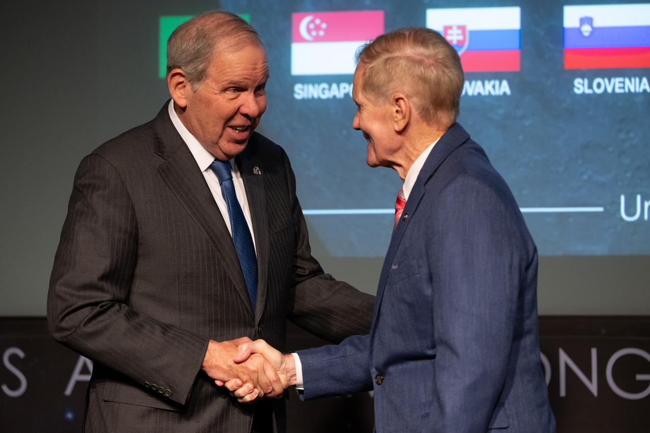 Ambassador of the Republic of Panama to the United States of America José Miguel Alemán, left, shakes hands with NASA Administrator Bill Nelson after delivering remarks during an Artemis Accords signing ceremony, Wednesday, Dec. 11, 2024, at the Mary W. Jackson NASA Headquarters building in Washington. The Republic of Armenia is the 49th country to sign the Artemis Accords, which establish a practical set of principles to guide space exploration cooperation among nations participating in NASA’s Artemis program. Photo Credit: (NASA/Joel Kowsky)