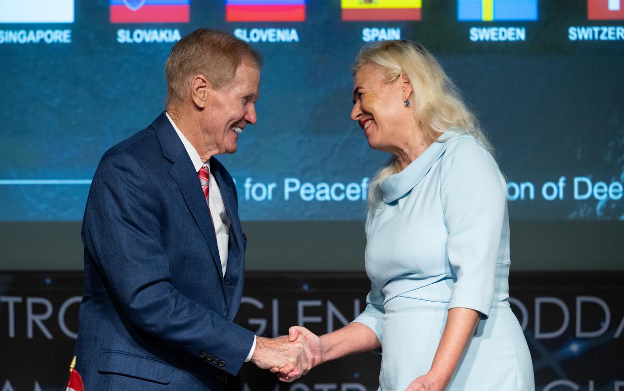 NASA Administrator Bill Nelson, left, and Ambassador of the Republic of Austria to the United States of America Petra Schneebauer, shake hands after the Republic of Austria signed the Artemis Accords, Wednesday, Dec. 11, 2024, at the Mary W. Jackson NASA Headquarters building in Washington. The Republic of Austria is the 50th country to sign the Artemis Accords, which establish a practical set of principles to guide space exploration cooperation among nations participating in NASA’s Artemis program.  Photo Credit: (NASA/Joel Kowsky)