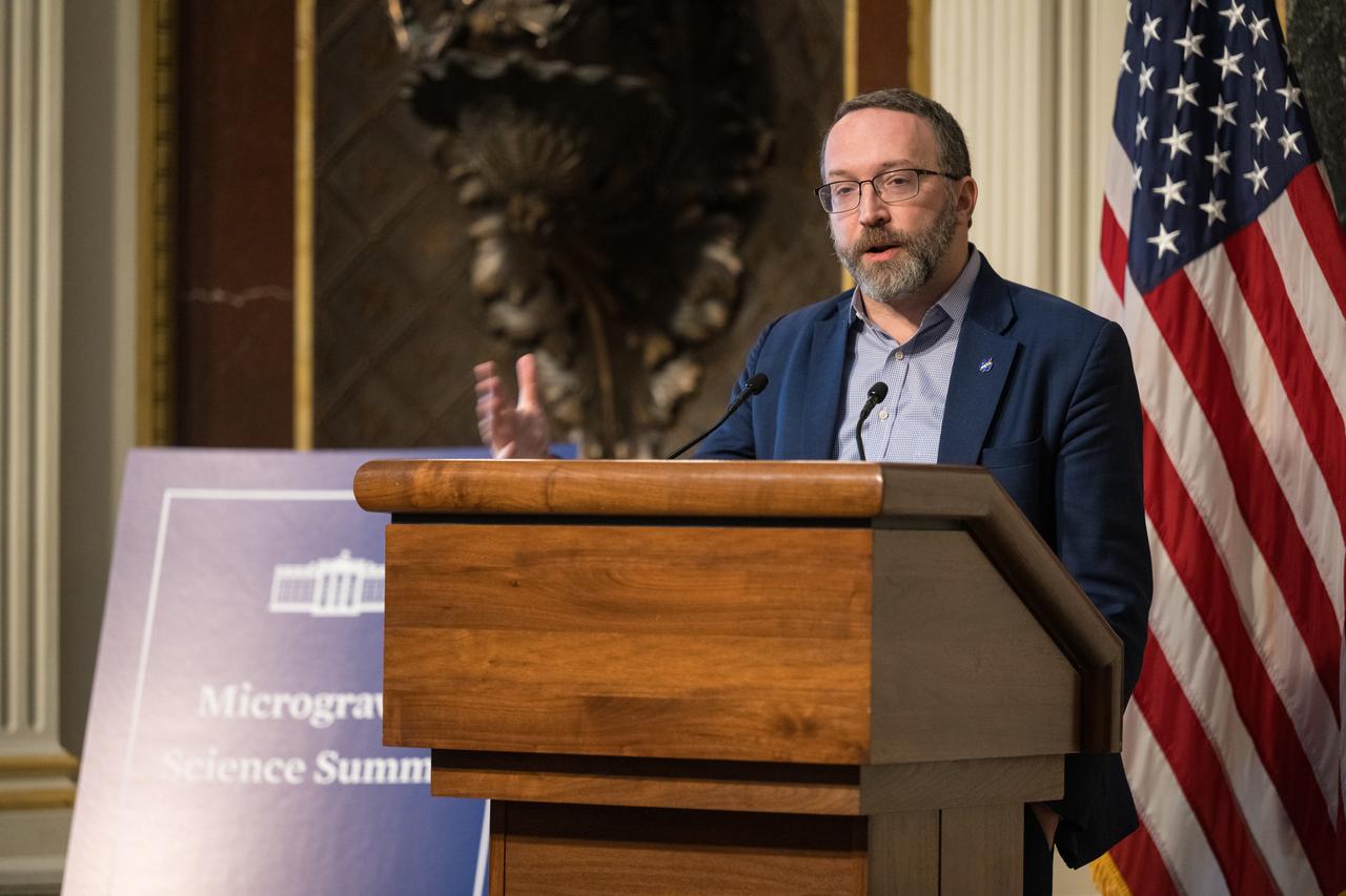 NASA Chief Economist Alex MacDonald speaks at the Microgravity Science Summit at the Eisenhower Executive Office Building, Monday, Dec. 13, 2024 in Washington. Photo Credit: (NASA/Aubrey Gemignani)