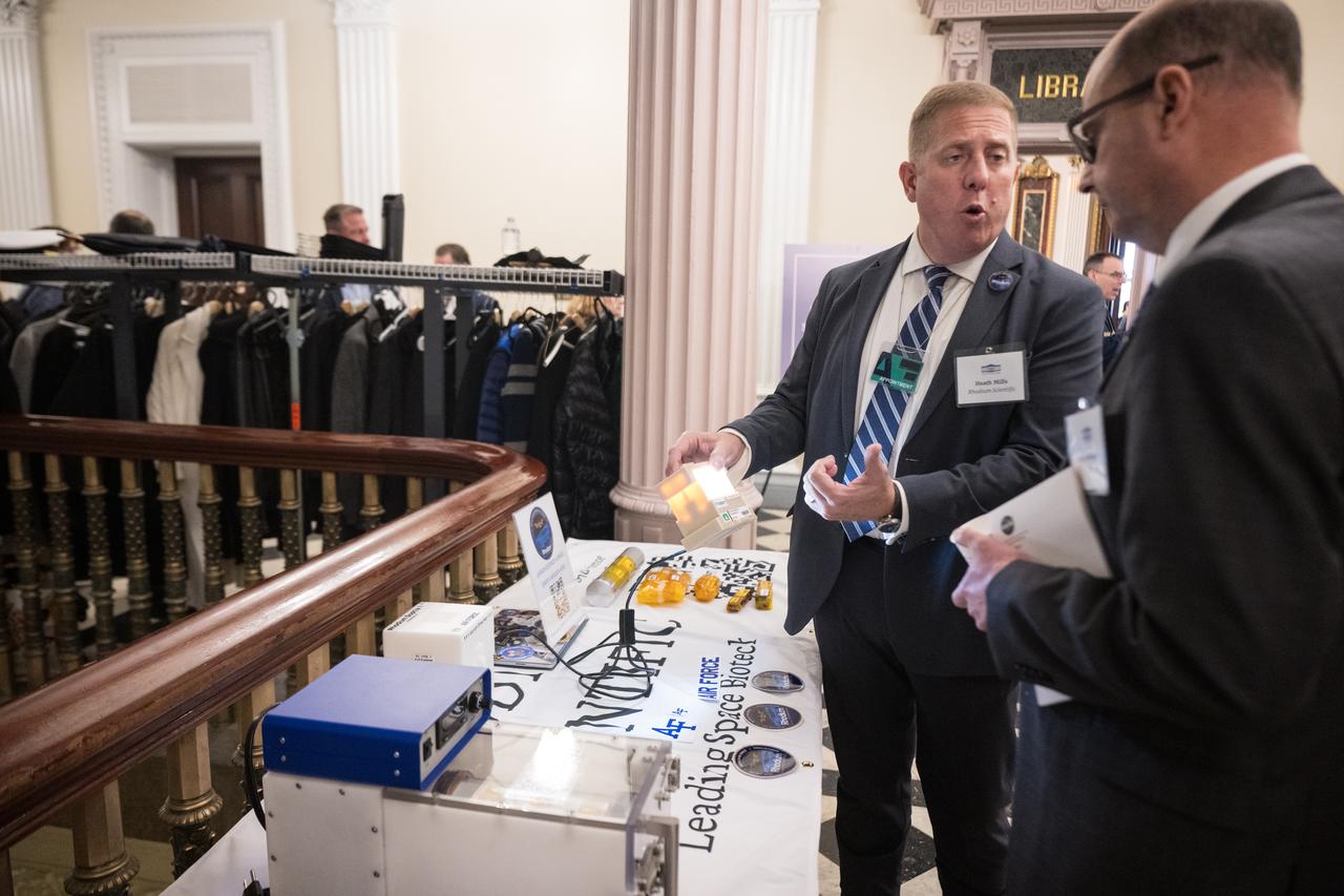 Exhibitors display hardware used in microgravity at the Microgravity Science Summit at the Eisenhower Executive Office Building, Monday, Dec. 13, 2024 in Washington. Photo Credit: (NASA/Aubrey Gemignani)