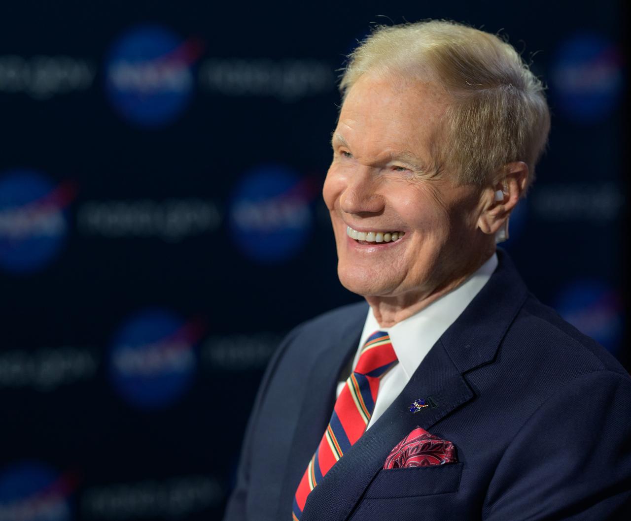NASA Administrator Bill Nelson, smiles, as he and NASA Deputy Administrator Pam Melroy have an Earth-to-space call with astronauts aboard the International Space Station, Wednesday, Jan. 8, 2025, at the Mary W. Jackson NASA Headquarters building in Washington. Nelson and Melroy spoke with NASA astronauts Nick Hague, Butch Wilmore, Suni Williams, and Don Pettit. Photo Credit: (NASA/Bill Ingalls)
