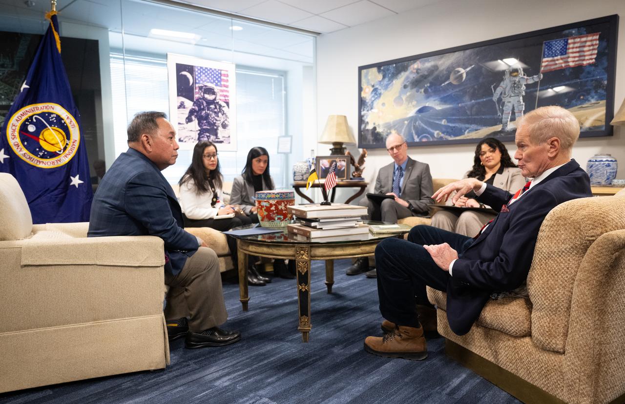 NASA Administrator Bill Nelson, right, His Excellency Dato Paduka Serbini Ali, Ambassador of Brunei to the United States, left, speak alongside Izzati Baharuddin, Deputy Chief of Mission, Embassy of Brunei to the United States, second from left, and Najaah Ra’emi Maleek, Second Secretary, Embassy of Brunei to the United States, third from left, Gilbert Kirkham, science division director in NASA’s Office of International and Interagency Relations, second from right, and Lenai Johnson, international program specialist in NASA’s Office of International and Interagency Relations, second from right, during a courtesy visit during a courtesy visit, Wednesday, Jan. 8, 2025 at the Mary W. Jackson NASA Headquarters building in Washington.  Photo Credit: (NASA/Joel Kowsky)