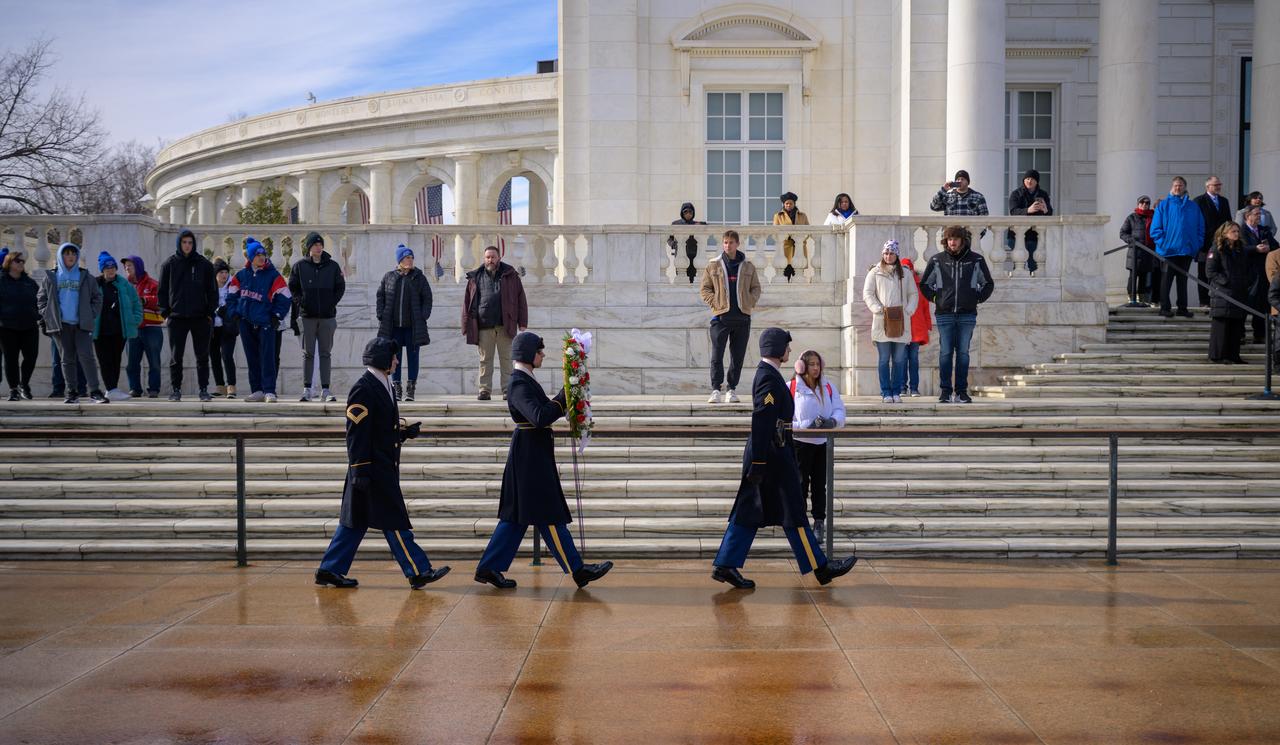 Members of The Old Guard, 3rd U.S. Infantry Regiment, bring a wreath that will be laid at the Tomb of the Unknowns by NASA acting Administrator Janet Petro and NASA Astronaut Kayla Barron as part of NASA's Day of Remembrance, Thursday, Jan. 23, 2025, at Arlington National Cemetery in Arlington, Va.  The wreaths were laid in memory of those men and women who lost their lives in the quest for space exploration.  Photo Credit: (NASA/Bill Ingalls)
