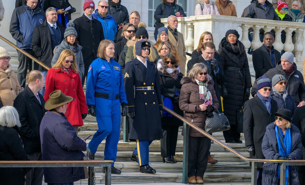 NASA acting Administrator Janet Petro, left in red, and NASA Astronaut Kayla Barron, prepare to lay a wreath at the Tomb of the Unknowns as part of NASA's Day of Remembrance, Thursday, Jan. 23, 2025, at Arlington National Cemetery in Arlington, Va. The wreaths were laid in memory of those men and women who lost their lives in the quest for space exploration. Photo Credit: (NASA/Bill Ingalls)