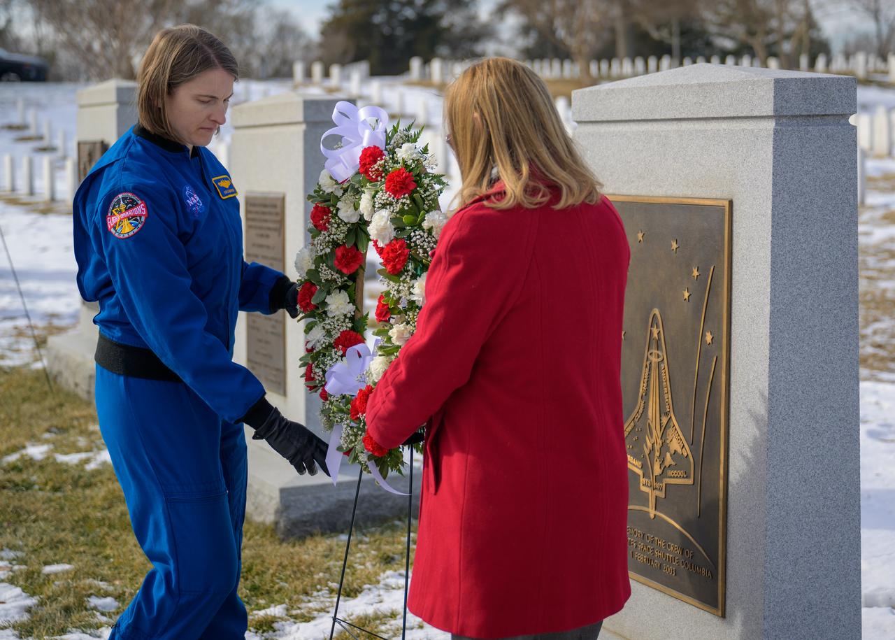 NASA Astronaut Kayla Barron, left, and NASA acting Administrator Janet Petro, place a wreath at the Space Shuttle Columbia Memorial as part of NASA's Day of Remembrance, Thursday, Jan. 23, 2025, at Arlington National Cemetery in Arlington, Va. Wreaths were laid in memory of those men and women who lost their lives in the quest for space exploration. Photo Credit: (NASA/Bill Ingalls)