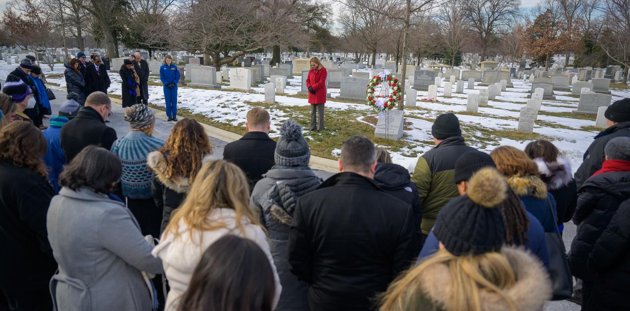 NASA acting Administrator Janet Petro leads guests to a moment of silence at the Apollo 1 monument as part of NASA's Day of Remembrance, Thursday, Jan. 23, 2025, at Arlington National Cemetery in Arlington, Va. The monument honors and memorializes the Apollo 1 crew of Virgil I. “Gus” Grissom, Edward H. White II, and Roger B. Chaffee. Photo Credit: (NASA/Bill Ingalls)