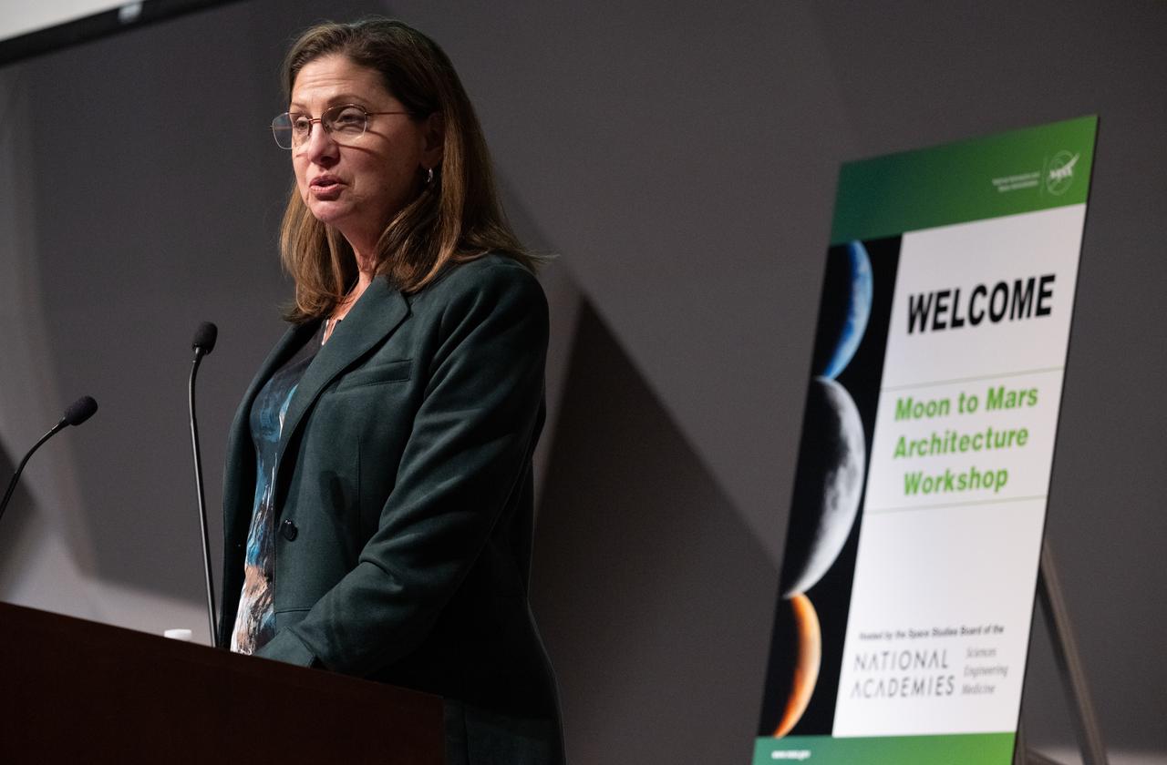 Catherine Koerner, associate administrator for NASA’s Exploration Systems Development Mission Directorate, gives opening remarks at the Moon to Mars Architecture Workshop, Wednesday, Feb. 12, 2025, at the National Academy of Sciences in Washington. NASA held the workshop to engage the broader space community and collect feedback from U.S. industry and academia and international partners to inform NASA's Moon to Mars Architecture, the agency's roadmap for human exploration of the Moon and Mars. Photo Credit: (NASA/Joel Kowsky)