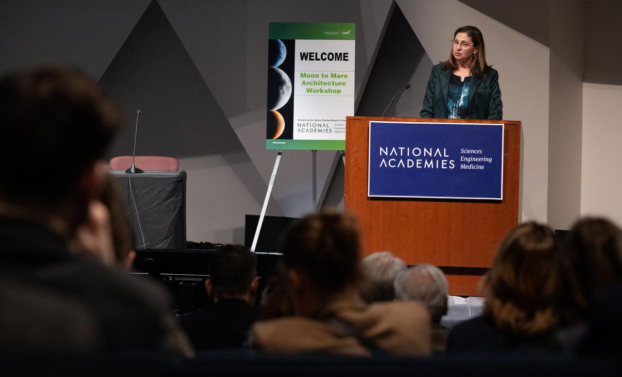 Catherine Koerner, associate administrator for NASA’s Exploration Systems Development Mission Directorate, gives opening remarks at the Moon to Mars Architecture Workshop, Wednesday, Feb. 12, 2025, at the National Academy of Sciences in Washington. NASA held the workshop to engage the broader space community and collect feedback from U.S. industry and academia and international partners to inform NASA's Moon to Mars Architecture, the agency's roadmap for human exploration of the Moon and Mars. Photo Credit: (NASA/Joel Kowsky)
