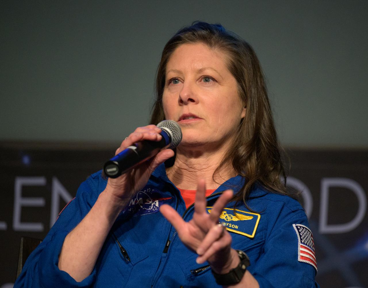 NASA astronaut Tracy Dyson, is seen during an Expedition 71 postflight presentation, Monday, March 3, 2025, at the Mary W. Jackson NASA Headquarters Building in Washington. Dyson, Michael Barrett, Matthew Dominick, and Jeanette Epps served as part of Expedition 71 aboard the International Space Station. Photo Credit: (NASA/Bill Ingalls)