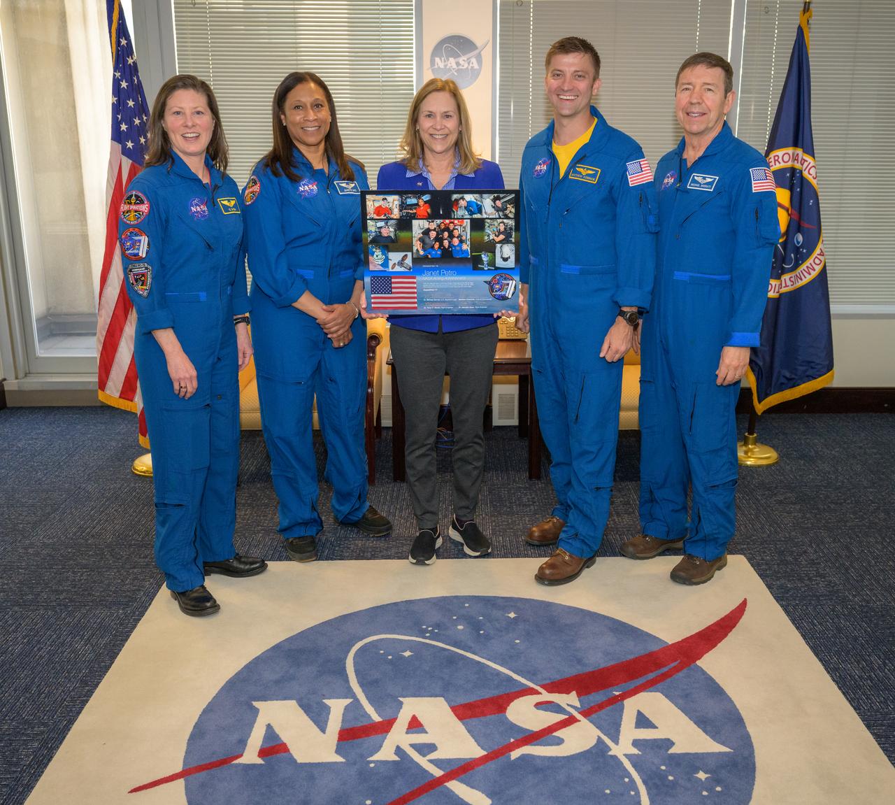 NASA acting Administrator Janet Petro, center, poses fro a group photograph with NASA Expedition 71 astronauts Tracy Dyson, left, Jeanette Epps, Matthew Dominick, and Michael Barratt, right, Monday, March 3, 2025, at the Mary W. Jackson NASA Headquarters Building in Washington. Dominick, Epps, Barratt, and Dyson served as part of Expedition 71 aboard the International Space Station. Photo Credit: (NASA/Bill Ingalls)