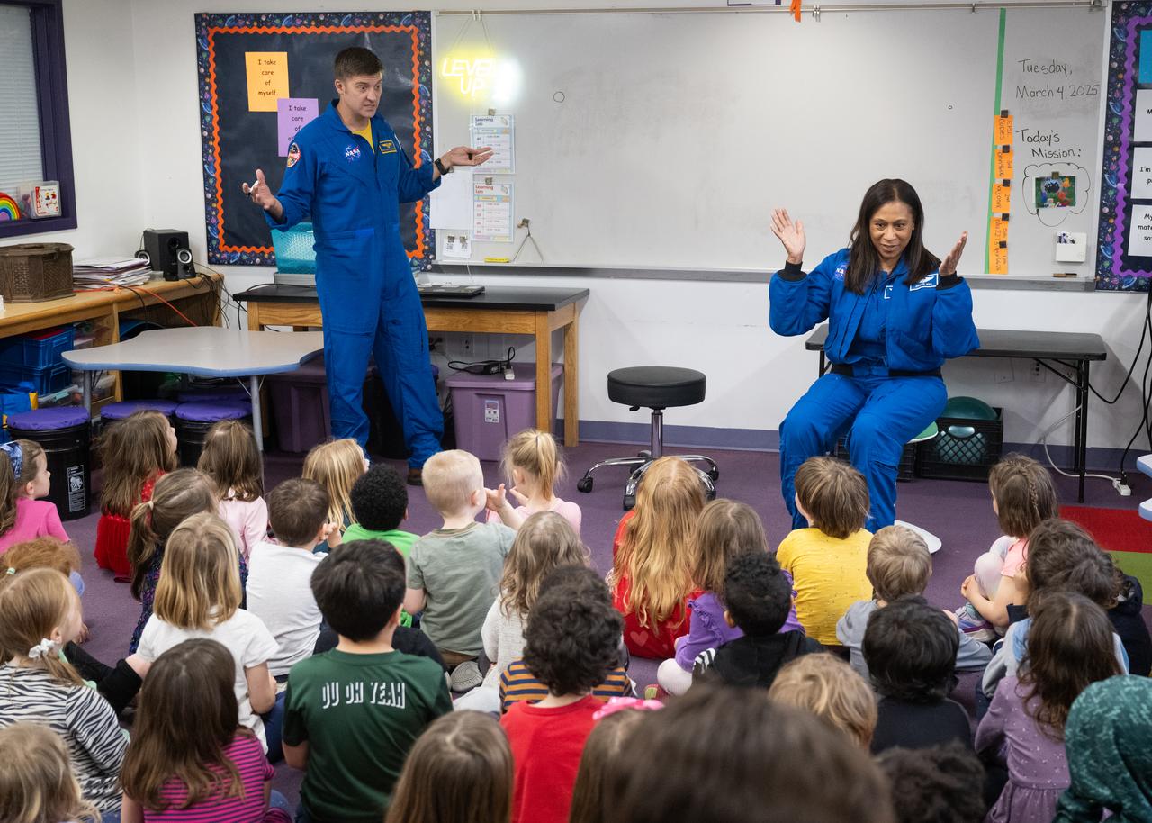 Expedition 71 NASA astronauts Matthew Dominick, left, and Jeanette Epps, speak to students, Wednesday, March 5, 2025, at Elsie Whitlow Stokes Community Freedom Public Charter School in Washington. Dominick, Epps, and fellow crewmates Michael Barratt and Tracy Dyson served as part of Expedition 71 aboard the International Space Station. Photo Credit: (NASA/Joel Kowsky)