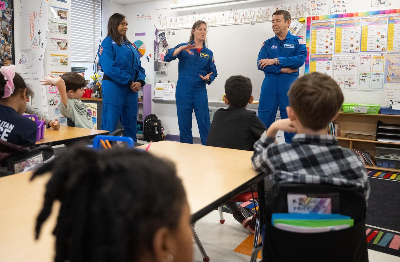 Expedition 71 NASA astronauts Jeanette Epps, left, Tracy Dyson, and Michael Barratt, speak to students, Wednesday, March 5, 2025 at Elsie Whitlow Stokes Community Freedom Public Charter School in Washington. Epps, Barratt, and Dyson served as part of Expedition 71 aboard the International Space Station.  Photo Credit: (NASA/Joel Kowsky)