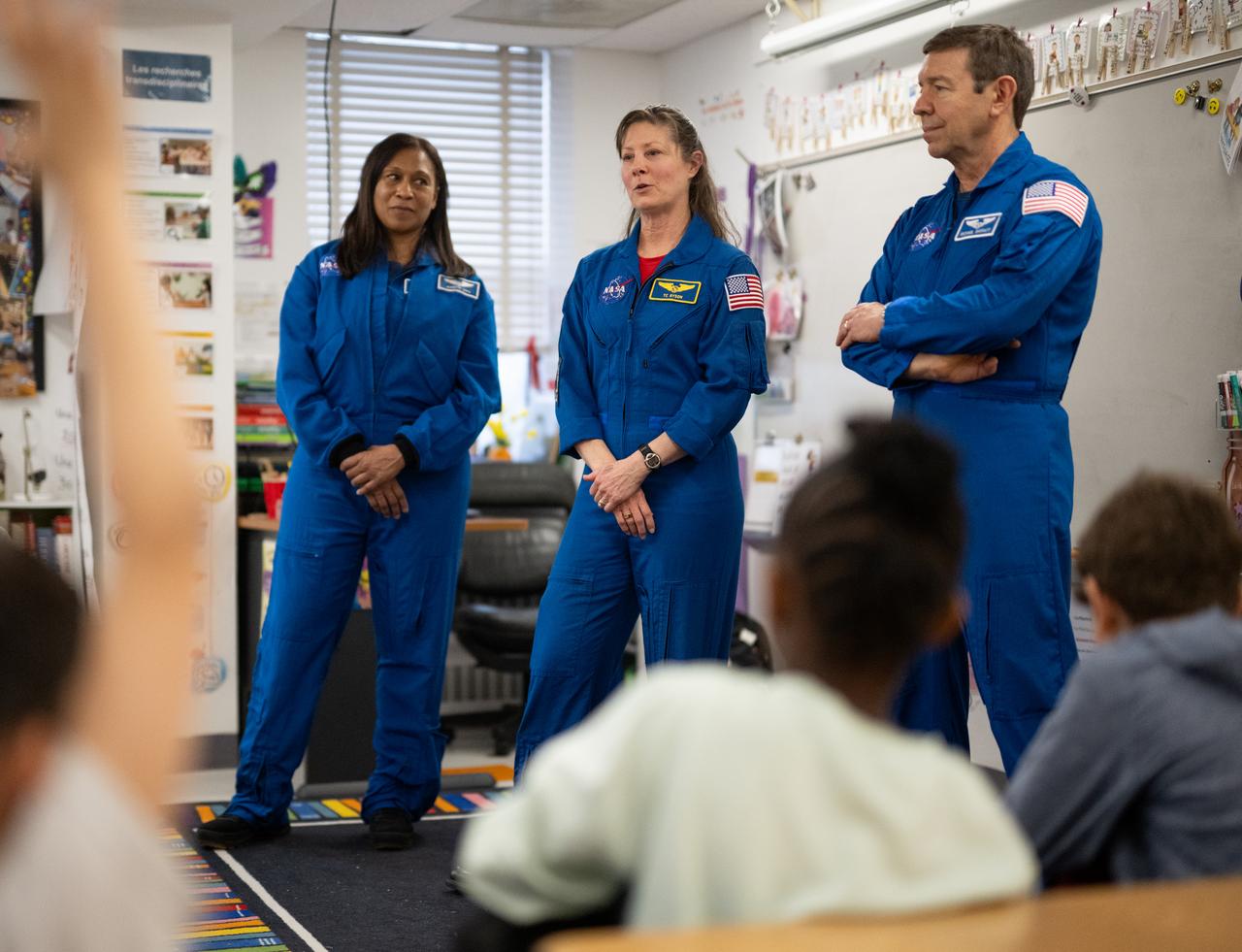 Expedition 71 NASA astronauts Jeanette Epps, left, Tracy Dyson, and Michael Barratt, speak to students, Wednesday, March 5, 2025 at Elsie Whitlow Stokes Community Freedom Public Charter School in Washington. Epps, Barratt, and Dyson served as part of Expedition 71 aboard the International Space Station.  Photo Credit: (NASA/Joel Kowsky)