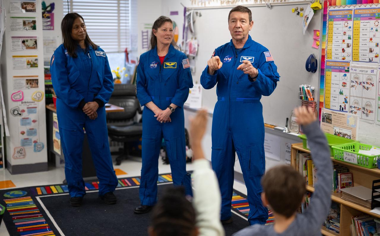 Expedition 71 NASA astronauts Jeanette Epps, left, Tracy Dyson, and Michael Barratt, speak to students, Wednesday, March 5, 2025 at Elsie Whitlow Stokes Community Freedom Public Charter School in Washington. Epps, Barratt, and Dyson served as part of Expedition 71 aboard the International Space Station.  Photo Credit: (NASA/Joel Kowsky)