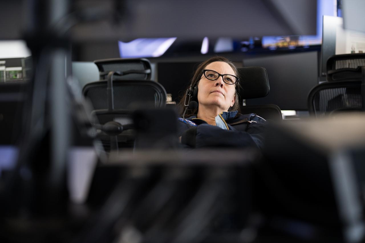 NASA's chief flight director, Emily Nelson, monitors the countdown during a dress rehearsal in preparation for the launch of a SpaceX Falcon 9 rocket carrying the company's Dragon spacecraft on NASA’s SpaceX Crew-10 mission with NASA astronauts Anne McClain and Nichole Ayers, JAXA (Japan Aerospace Exploration Agency) astronaut Takuya Onishi, and Roscosmos cosmonaut Kirill Peskov onboard, Sunday, March 9, 2025, in the control room of SpaceX’s HangarX at NASA’s Kennedy Space Center in Florida. NASA’s SpaceX Crew-10 mission is the tenth crew rotation mission of the SpaceX Dragon spacecraft and Falcon 9 rocket to the International Space Station as part of the agency’s Commercial Crew Program. McClain, Ayers, Onishi, and Peskov are scheduled to launch at 7:48 p.m. EDT on Wednesday, March 12, from Launch Complex 39A at the NASA's Kennedy Space Center. Photo Credit: (NASA/Aubrey Gemignani)