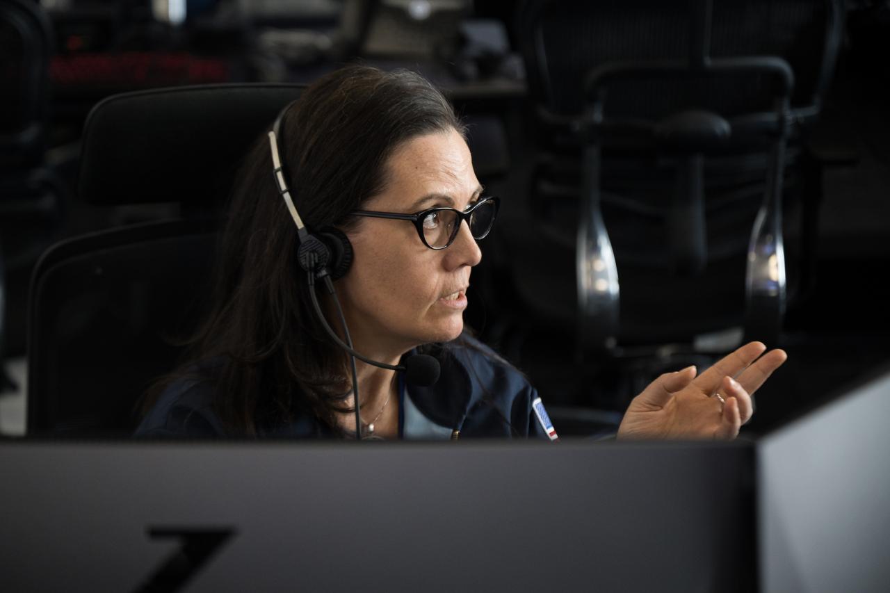 NASA's chief flight director, Emily Nelson, monitors the countdown during a dress rehearsal in preparation for the launch of a SpaceX Falcon 9 rocket carrying the company's Dragon spacecraft on NASA’s SpaceX Crew-10 mission with NASA astronauts Anne McClain and Nichole Ayers, JAXA (Japan Aerospace Exploration Agency) astronaut Takuya Onishi, and Roscosmos cosmonaut Kirill Peskov onboard, Sunday, March 9, 2025, in the control room of SpaceX’s HangarX at NASA’s Kennedy Space Center in Florida. NASA’s SpaceX Crew-10 mission is the tenth crew rotation mission of the SpaceX Dragon spacecraft and Falcon 9 rocket to the International Space Station as part of the agency’s Commercial Crew Program. McClain, Ayers, Onishi, and Peskov are scheduled to launch at 7:48 p.m. EDT on Wednesday, March 12, from Launch Complex 39A at the NASA's Kennedy Space Center. Photo Credit: (NASA/Aubrey Gemignani)