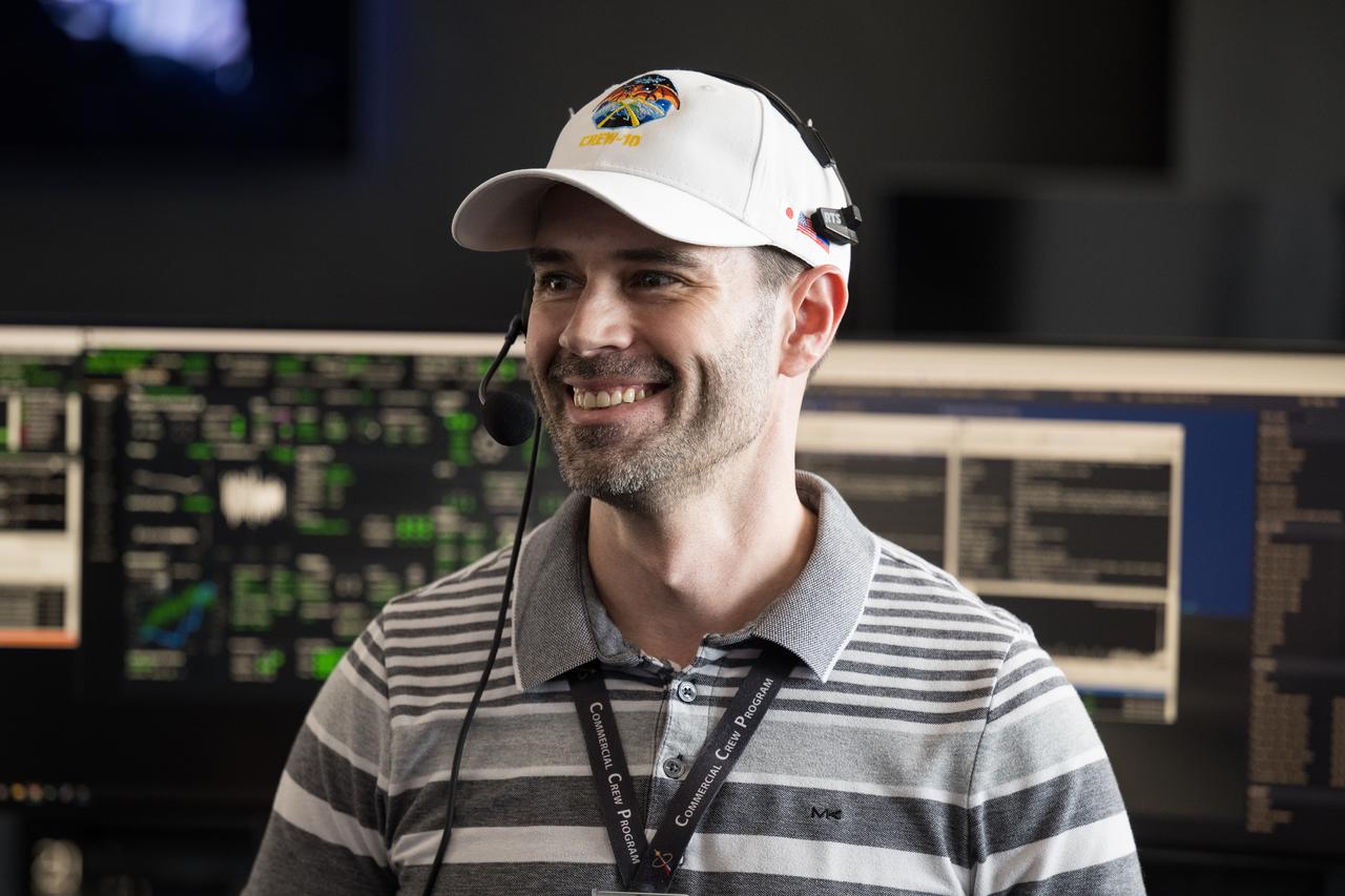John Posey, NASA’s Crew Dragon Lead Engineer, serving as NASA chief engineer for this launch, monitors the countdown during a dress rehearsal in preparation for the launch of a SpaceX Falcon 9 rocket carrying the company's Dragon spacecraft on NASA’s SpaceX Crew-10 mission with NASA astronauts Anne McClain and Nichole Ayers, JAXA (Japan Aerospace Exploration Agency) astronaut Takuya Onishi, and Roscosmos cosmonaut Kirill Peskov onboard, Sunday, March 9, 2025, in the control room of SpaceX’s HangarX at NASA’s Kennedy Space Center in Florida. NASA’s SpaceX Crew-10 mission is the tenth crew rotation mission of the SpaceX Dragon spacecraft and Falcon 9 rocket to the International Space Station as part of the agency’s Commercial Crew Program. McClain, Ayers, Onishi, and Peskov are scheduled to launch at 7:48 p.m. EDT on Wednesday, March 12, from Launch Complex 39A at the NASA's Kennedy Space Center. Photo Credit: (NASA/Aubrey Gemignani)
