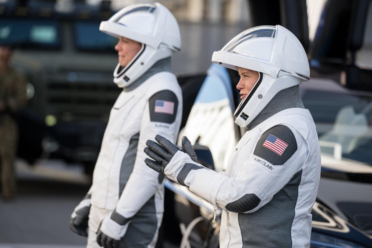 NASA astronauts Anne McClain and Nichole Ayers speak with family and friends as they prepare to depart the Neil  A. Armstrong Operations and Checkout Building for Launch Complex 39A on NASA's Kennedy Space Center to board the SpaceX Dragon spacecraft for the Crew-10 mission launch, Wednesday, March 12, 2025, at NASA’s Kennedy Space Center in Florida. NASA’s SpaceX Crew-10 mission is the tenth crew rotation mission of the SpaceX Crew Dragon spacecraft and Falcon 9 rocket to the International Space Station as part of the agency’s Commercial Crew Program. McClain, Ayers, JAXA (Japan Aerospace Exploration Agency) astronaut Takuya Onishi, and Roscosmos cosmonaut Kirill Peskov are scheduled to launch at 7:48 p.m. EDT, from Launch Complex 39A at the NASA's Kennedy Space Center.  Photo Credit: (NASA/Aubrey Gemignani)