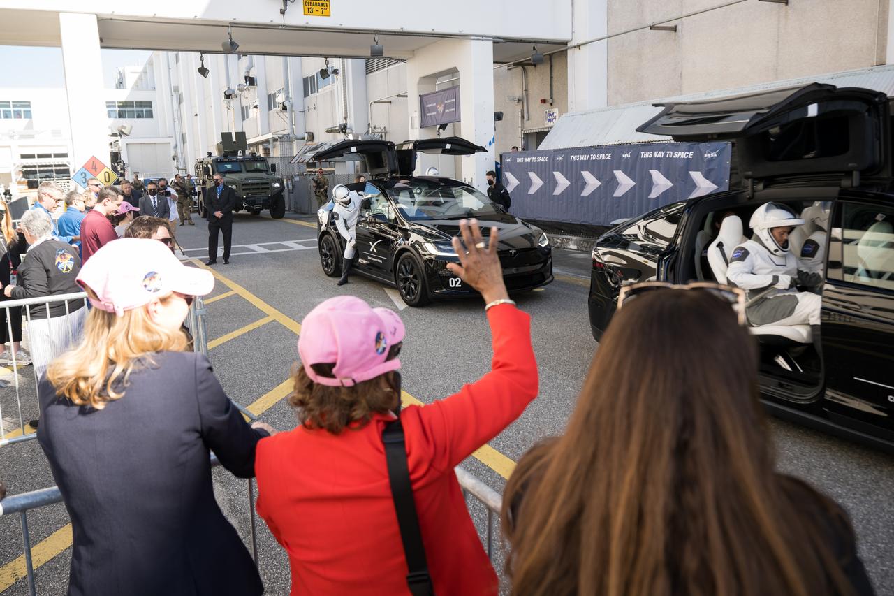 From left to right, Acting NASA Administrator Janet Petro, Acting NASA Associate Administrator Vanessa Wyche, and NASA deputy associate administrator Casey Swails wave to NASA astronauts Anne McClain and Nichole Ayers, JAXA (Japan Aerospace Exploration Agency) astronaut Takuya Onishi, and Roscosmos cosmonaut Kirill Peskov, as they prepare to depart the Neil  A. Armstrong Operations and Checkout Building for Launch Complex 39A on NASA's Kennedy Space Center to board the SpaceX Dragon spacecraft for the Crew-10 mission launch, Wednesday, March 12, 2025, at NASA’s Kennedy Space Center in Florida. NASA’s SpaceX Crew-10 mission is the tenth crew rotation mission of the SpaceX Crew Dragon spacecraft and Falcon 9 rocket to the International Space Station as part of the agency’s Commercial Crew Program. McClain, Ayers, Onishi, and Peskov are scheduled to launch at 7:48 p.m. EDT, from Launch Complex 39A at the NASA's Kennedy Space Center.  Photo Credit: (NASA/Aubrey Gemignani)