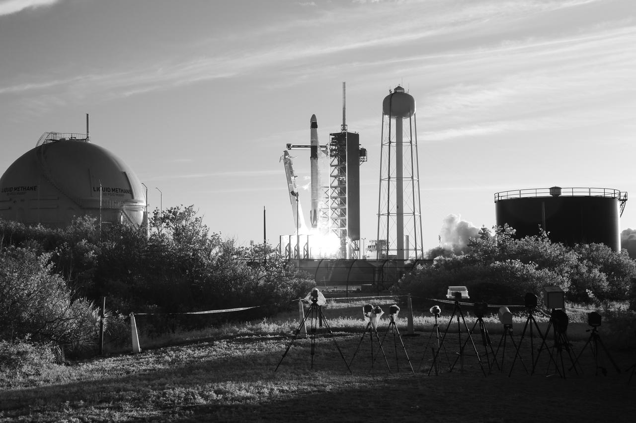 In this black and white infrared image, a SpaceX Falcon 9 rocket carrying the company's Dragon spacecraft is launched on NASA’s SpaceX Crew-10 mission to the International Space Station with NASA astronauts Anne McClain and Nichole Ayers, JAXA (Japan Aerospace Exploration Agency) astronaut Takuya Onishi, and Roscosmos cosmonaut Kirill Peskov onboard, Tuesday, March 11, 2025, from NASA's Kennedy Space Center in Florida. NASA’s SpaceX Crew-10 mission is the tenth crew rotation mission of the SpaceX Dragon spacecraft and Falcon 9 rocket to the International Space Station as part of the agency’s Commercial Crew Program. McClain, Ayers, Onishi, and Peskov launched at 7:03 p.m. EDT from Launch Complex 39A at the NASA's Kennedy Space Center to begin a six month mission aboard the orbital outpost. Photo Credit: (NASA/Aubrey Gemignani)