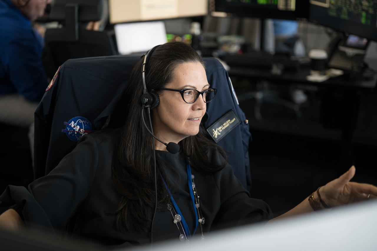 Emily Nelson, NASA's chief flight director, monitors the launch of a SpaceX Falcon 9 rocket carrying the company's Dragon spacecraft on the Crew-10 mission with NASA astronauts Anne McClain and Nichole Ayers, JAXA (Japan Aerospace Exploration Agency) astronaut Takuya Onishi, and Roscosmos cosmonaut Kirill Peskov onboard, Friday, March 14, 2025, in the control room of SpaceX’s HangarX at NASA’s Kennedy Space Center in Florida. NASA’s SpaceX Crew-10 mission is the tenth crew rotation mission of the SpaceX Dragon spacecraft and Falcon 9 rocket to the International Space Station as part of the agency’s Commercial Crew Program. McClain, Ayers, Onishi, and Peskov launched at 7:03 p.m. EDT, from Launch Complex 39A at the Kennedy Space Center. Photo Credit: (NASA/Aubrey Gemignani)