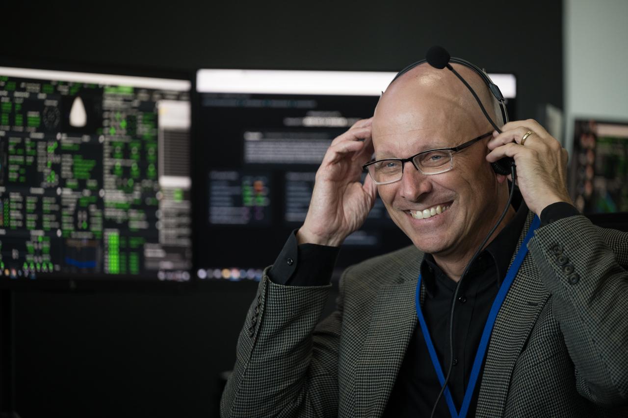 NASA’s Johnson Space Center acting director Stephen Koerner, monitors the launch of a SpaceX Falcon 9 rocket carrying the company's Dragon spacecraft on the Crew-10 mission with NASA astronauts Anne McClain and Nichole Ayers, JAXA (Japan Aerospace Exploration Agency) astronaut Takuya Onishi, and Roscosmos cosmonaut Kirill Peskov onboard, Friday, March 14, 2025, in the control room of SpaceX’s HangarX at NASA’s Kennedy Space Center in Florida. NASA’s SpaceX Crew-10 mission is the tenth crew rotation mission of the SpaceX Dragon spacecraft and Falcon 9 rocket to the International Space Station as part of the agency’s Commercial Crew Program. McClain, Ayers, Onishi, and Peskov launched at 7:03 p.m. EDT, from Launch Complex 39A at the Kennedy Space Center. Photo Credit: (NASA/Aubrey Gemignani)