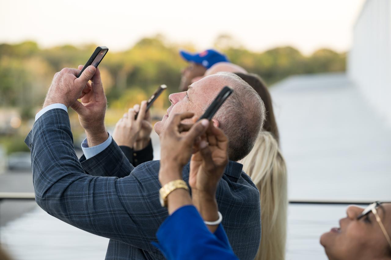 Norm Knight, director of Flight Operations at NASA's Johnson Space Center, Vanessa Wyche, acting NASA associate administrator, and other NASA leadership watch the landing of the booster after the launch of a SpaceX Falcon 9 rocket carrying the company's Dragon spacecraft on the Crew-10 mission with NASA astronauts Anne McClain and Nichole Ayers, JAXA (Japan Aerospace Exploration Agency) astronaut Takuya Onishi, and Roscosmos cosmonaut Kirill Peskov onboard, Friday, March 14, 2025, in the control room of SpaceX’s HangarX at NASA’s Kennedy Space Center in Florida. NASA’s SpaceX Crew-10 mission is the tenth crew rotation mission of the SpaceX Dragon spacecraft and Falcon 9 rocket to the International Space Station as part of the agency’s Commercial Crew Program. McClain, Ayers, Onishi, and Peskov launched at 7:03 p.m. EDT, from Launch Complex 39A at the Kennedy Space Center. Photo Credit: (NASA/Aubrey Gemignani)