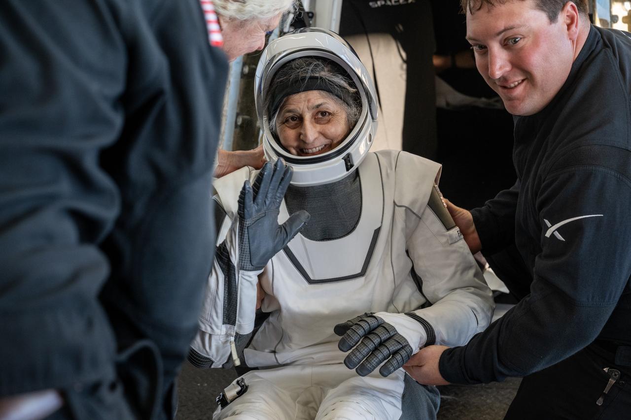 NASA astronaut Suni Williams is helped out of a SpaceX Dragon spacecraft onboard the SpaceX recovery ship MEGAN after she, NASA astronaut Nick Hague, and Butch Wilmore, and Roscosmos cosmonaut Aleksandr Gorbunov landed in the water off the coast of Tallahassee, Florida, Tuesday, March 18, 2025. Hague, Gorbunov, Williams, and Wilmore are returning from a long-duration science expedition aboard the International Space Station. Photo Credit: (NASA/Keegan Barber)