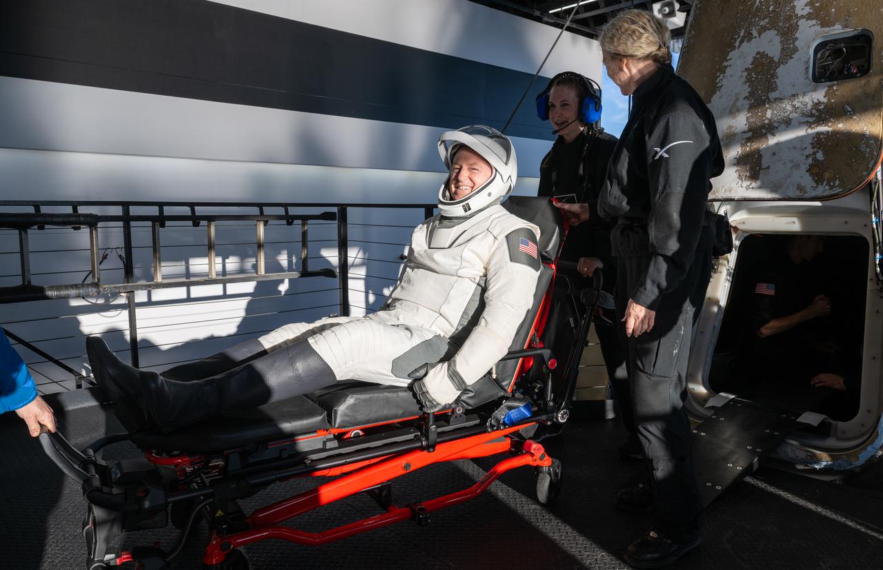 NASA astronaut Butch Wilmore is helped out of a SpaceX Dragon spacecraft onboard the SpaceX recovery ship MEGAN after he, NASA astronauts Nick Hague, Suni Williams, and Roscosmos cosmonaut Aleksandr Gorbunov landed in the water off the coast of Tallahassee, Florida, Tuesday, March 18, 2025. Hague, Gorbunov, Williams, and Wilmore are returning from a long-duration science expedition aboard the International Space Station. Photo Credit: (NASA/Keegan Barber)