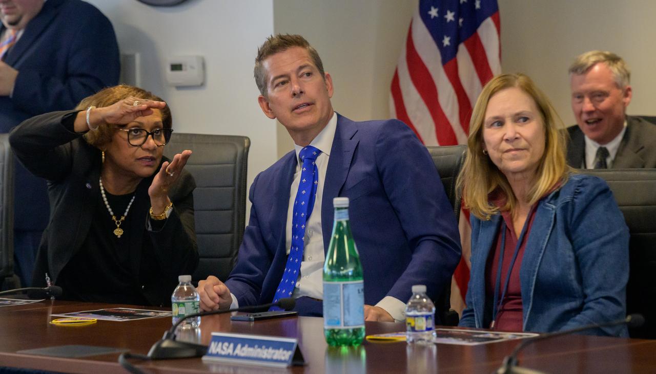 Acting NASA Associate Administrator Vanessa Wyche, left, U.S. Transportation Secretary Sean Duffy, and acting NASA Administrator Janet Petro, right, watch as the SpaceX Dragon spacecraft splashes down with NASA astronauts Butch Wilmore, Suni Williams, Nick Hague, and Roscosmos cosmonaut Aleksandr Gorbunov, Tuesday, March 18, 2025, from the Space Operations Center at the Mary W. Jackson NASA Headquarters Building in Washington. Photo Credit: (NASA/Bill Ingalls)