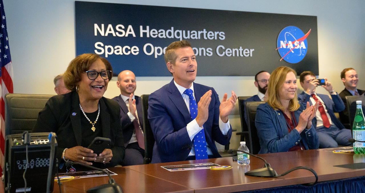 Acting NASA Associate Administrator Vanessa Wyche, left, U.S. Transportation Secretary Sean Duffy, and acting NASA Administrator Janet Petro, right, react as they watch the SpaceX Dragon spacecraft splash down with NASA astronauts Butch Wilmore, Suni Williams, Nick Hague, and Roscosmos cosmonaut Aleksandr Gorbunov, Tuesday, March 18, 2025, from the Space Operations Center at the Mary W. Jackson NASA Headquarters Building in Washington. Photo Credit: (NASA/Bill Ingalls)