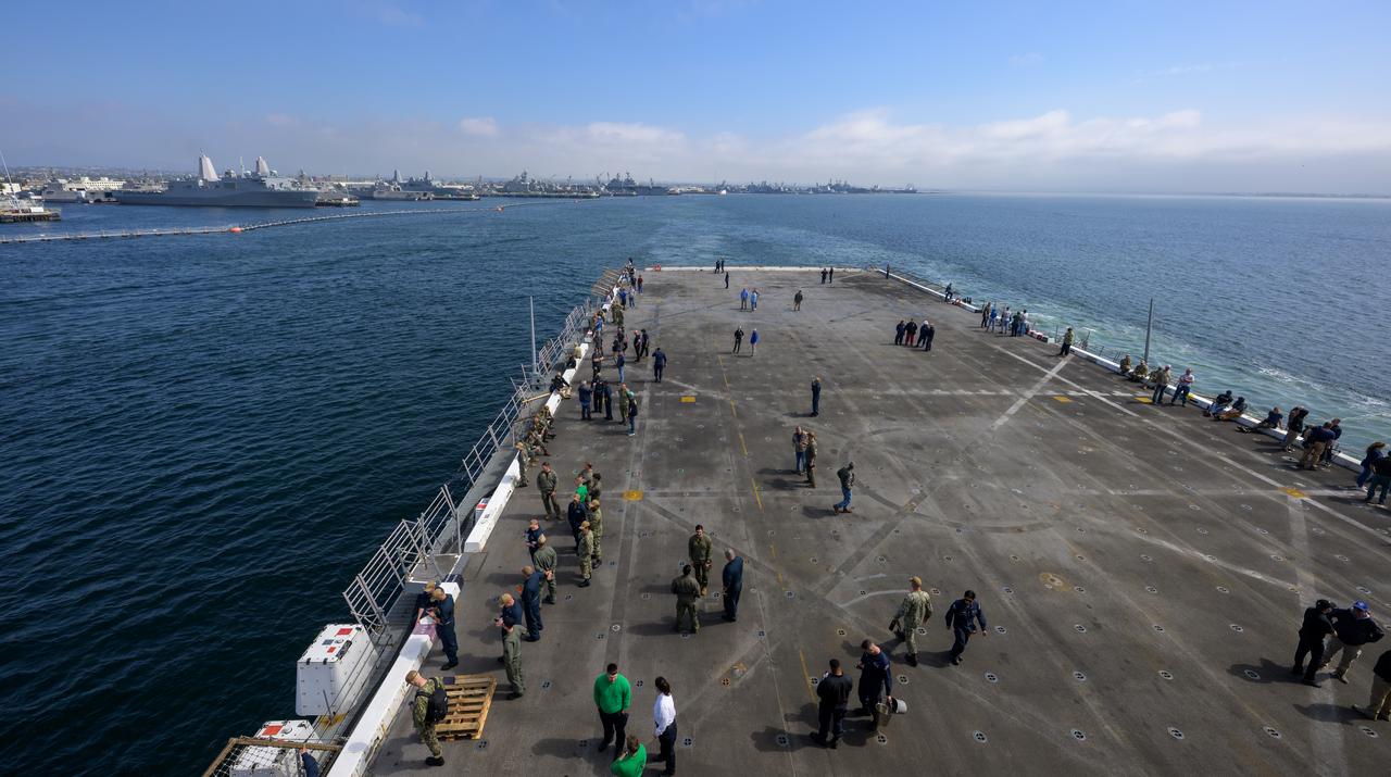 NASA and Department of Defense teams,  onboard USS Somerset, depart San Diego as they start Underway Recovery Test-12 off the coast of California, Tuesday, March 25, 2025. During the test, the teams are practicing to ensure recovery procedures are validated as NASA plans to send the Artemis II astronauts around the Moon and splashdown in the Pacific Ocean.  Photo Credit: (NASA/Bill Ingalls)