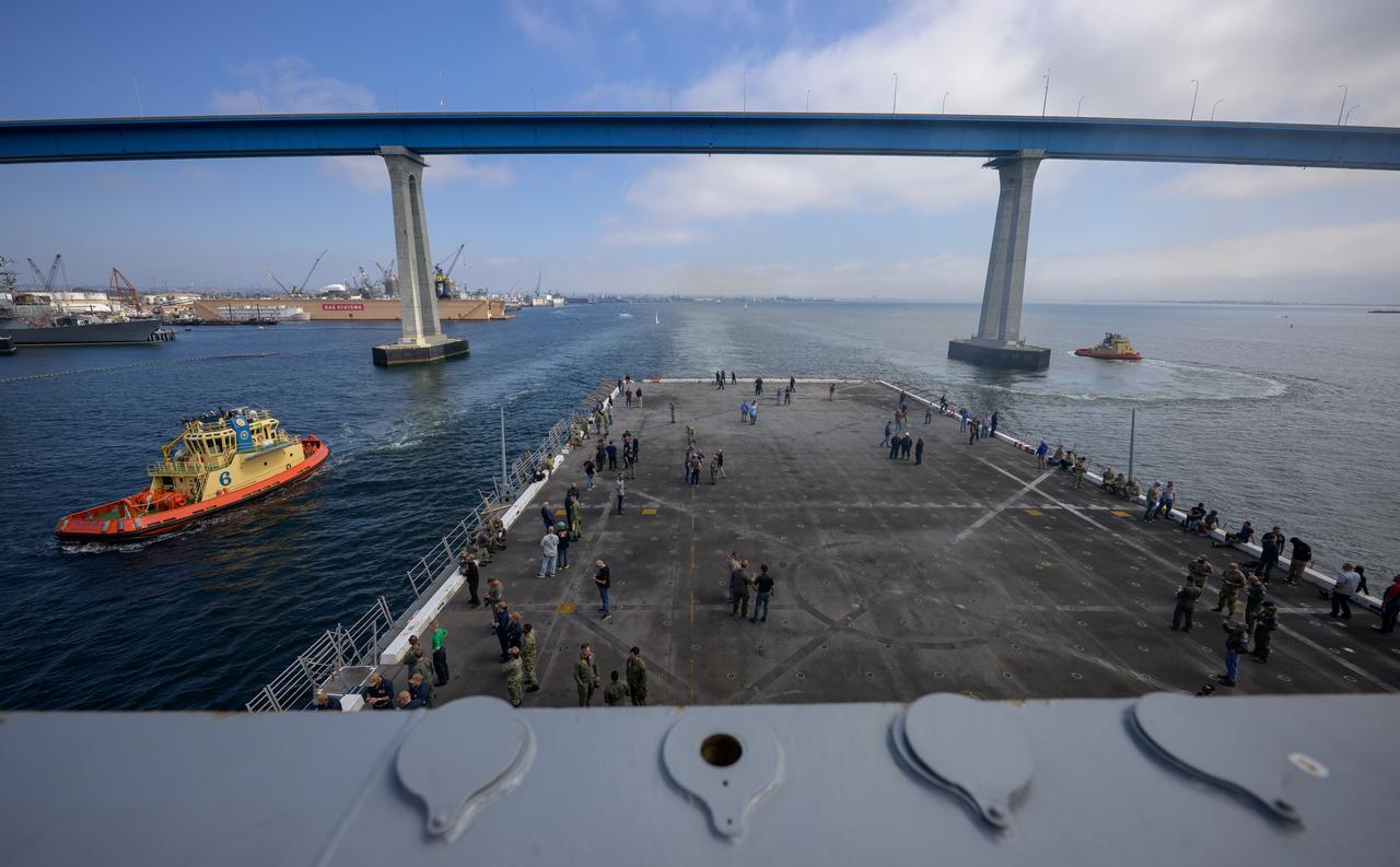 NASA and Department of Defense teams,  onboard USS Somerset, depart San Diego as they start Underway Recovery Test-12 off the coast of California, Tuesday, March 25, 2025. During the test, the teams are practicing to ensure recovery procedures are validated as NASA plans to send the Artemis II astronauts around the Moon and splashdown in the Pacific Ocean.  Photo Credit: (NASA/Bill Ingalls)
