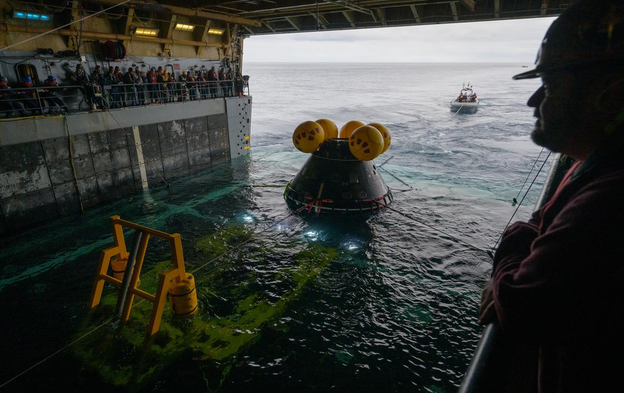 The Crew Module Test Article (CMTA), a full scale mockup of the Orion spacecraft, is seen during Underway Recovery Test-12 onboard USS Somerset off the coast of California, Wednesday, March 26, 2025. During the test, NASA and Department of Defense teams are practicing to ensure recovery procedures are validated as NASA plans to send Artemis II astronauts around the Moon and splashdown in the Pacific Ocean. Photo Credit: (NASA/Bill Ingalls)