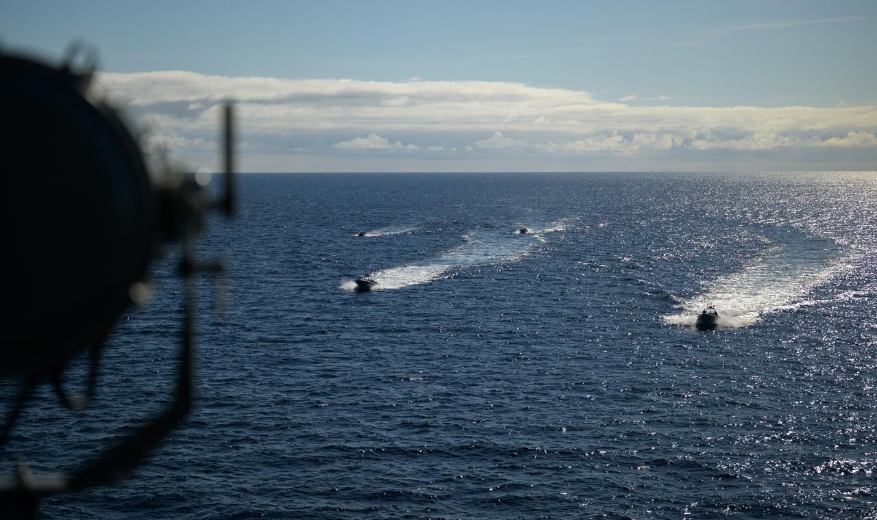Fast boats are deployed during Underway Recovery Test-12 onboard USS Somerset off the coast of California, Thursday, March 27, 2025. During the test, NASA and Department of Defense teams are practicing to ensure recovery procedures are validated as NASA plans to send Artemis II astronauts around the Moon and splashdown in the Pacific Ocean. Photo Credit: (NASA/Bill Ingalls)