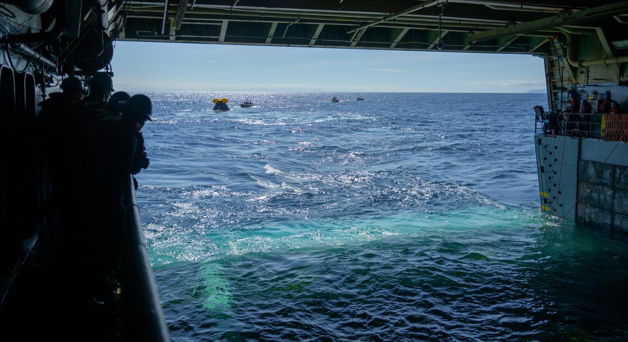 The Crew Module Test Article (CMTA), a full scale mockup of the Orion spacecraft, is seen during Underway Recovery Test-12 onboard USS Somerset off the coast of California, Thursday, March 27, 2025. During the test, NASA and Department of Defense teams are practicing to ensure recovery procedures are validated as NASA plans to send Artemis II astronauts around the Moon and splashdown in the Pacific Ocean. Photo Credit: (NASA/Bill Ingalls)