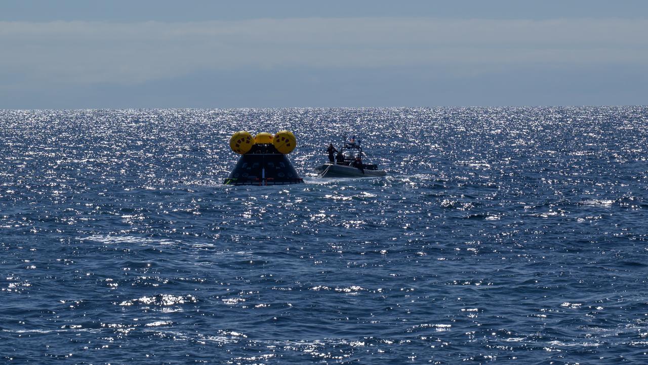 The Crew Module Test Article (CMTA), a full scale mockup of the Orion spacecraft, is seen during Underway Recovery Test-12 onboard USS Somerset off the coast of California, Thursday, March 27, 2025. During the test, NASA and Department of Defense teams are practicing to ensure recovery procedures are validated as NASA plans to send Artemis II astronauts around the Moon and splashdown in the Pacific Ocean. Photo Credit: (NASA/Bill Ingalls)