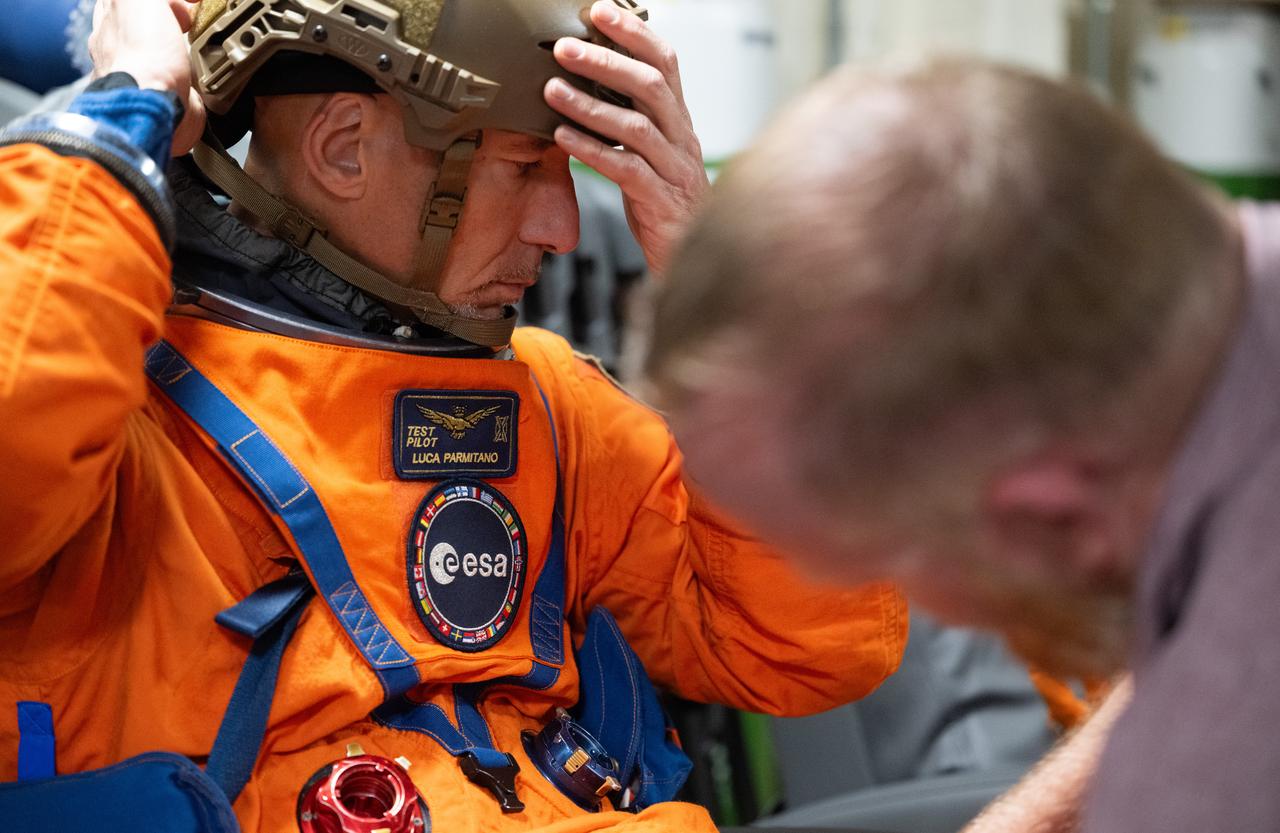 ESA (European Space Agency) astronaut Luca Parmitano is seen as he prepares to take part in practicing Artemis recovery procedures during Underway Recovery Test-12 onboard USS Somerset, Thursday, March 27, 2025. During the test, NASA and Department of Defense teams are practicing to ensure recovery procedures are validated as NASA plans to send the Artemis II astronauts around the Moon and splashdown in the Pacific Ocean.  Photo Credit: (NASA/Joel Kowsky)