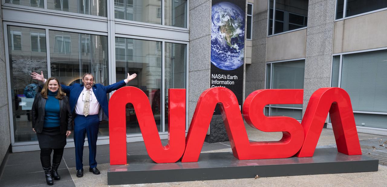 Dr. Karen St. Germain, NASA director of the Earth Science Division, left, and John Rhys-Davies, the actor best known for his roles as Gimli in The Lord of the Rings trilogy and Sallah in the Indiana Jones franchise, pose for a photo, Friday, March 28, 2025 at the Mary W. Jackson NASA Headquarters building in Washington, DC. Photo Credit: (NASA/Aubrey Gemignani)