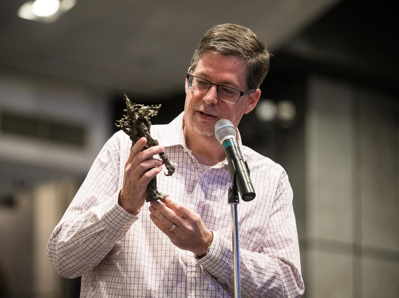 Jim Wilson, NASA public affairs officer, asks John Rhys-Davies, the actor best known for his roles as Gimli in The Lord of the Rings trilogy and Sallah in the Indiana Jones franchise, a question during an employee event, Friday, March 28, 2025 at the Mary W. Jackson NASA Headquarters building in Washington, DC. Photo Credit: (NASA/Aubrey Gemignani)