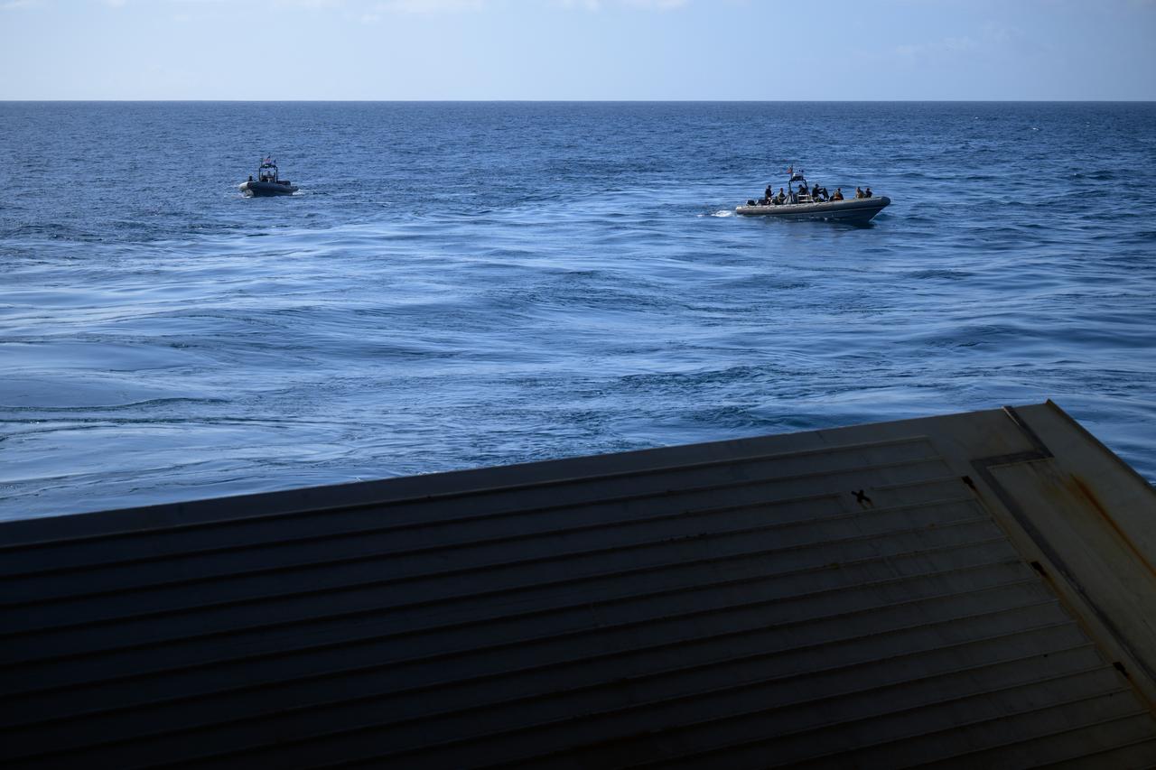 Fast boats are deployed during the Underway Recovery Test-12 onboard USS Somerset off the coast of California, Friday, March 28, 2025. During the test, NASA and Department of Defense teams are practicing to ensure recovery procedures are validated as NASA plans to send Artemis II astronauts around the Moon and splashdown in the Pacific Ocean.  Photo Credit: (NASA/Bill Ingalls)