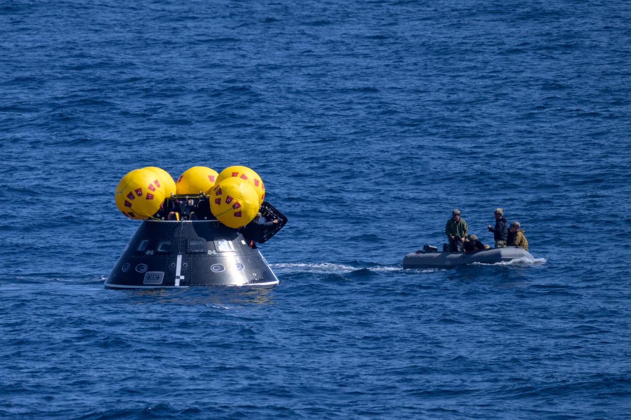 The Crew Module Test Article (CMTA), a full scale mockup of the Orion spacecraft, is seen during Underway Recovery Test-12 off the coast of California, Friday, March 28, 2025. During the test, NASA and Department of Defense teams are practicing to ensure recovery procedures are validated as NASA plans to send Artemis II astronauts around the Moon and splashdown in the Pacific Ocean.  Photo Credit: (NASA/Bill Ingalls)