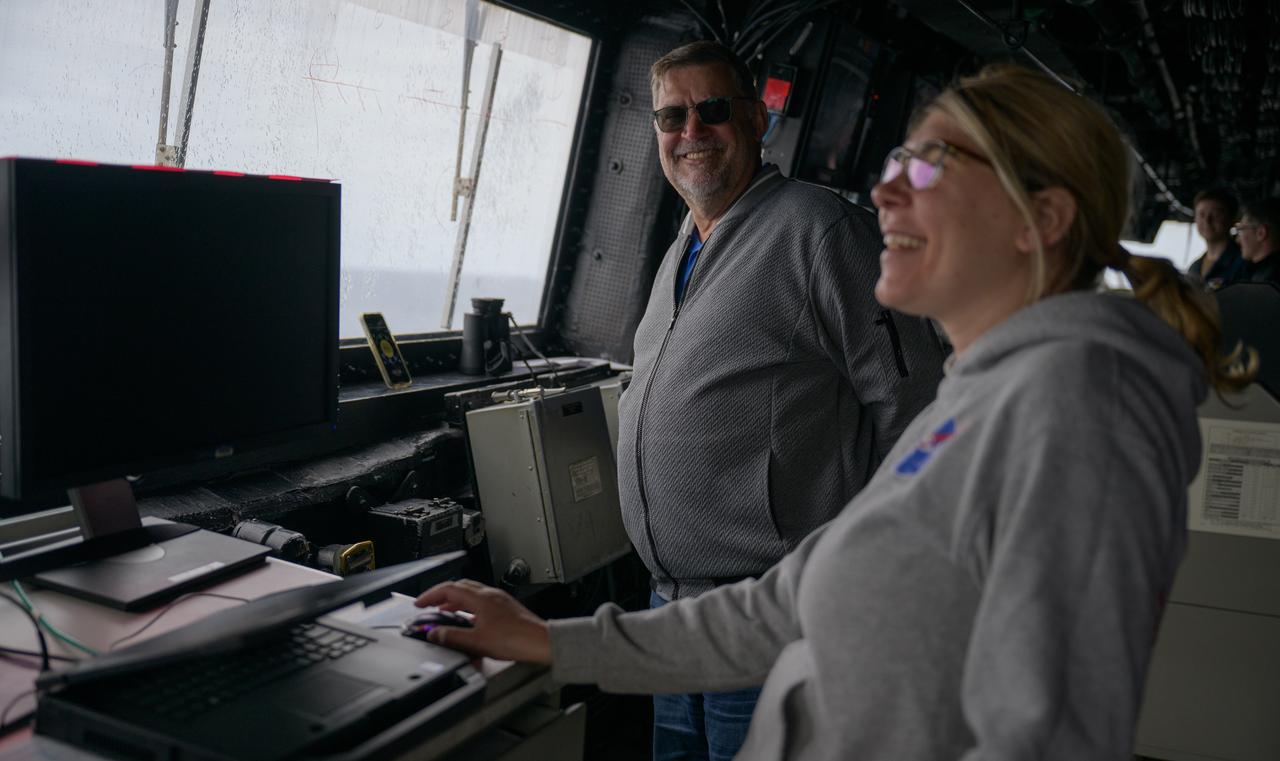 Members of NASA’s Landing and Recovery team are seen on the bridge of USS Somerset as teams practice Artemis recovery operations during Underway Recovery Test-12 off the coast of California, Saturday, March 29, 2025. During the test, NASA and Department of Defense teams are practicing to ensure recovery procedures are validated as NASA plans to send Artemis II around the Moon and splashdown in the Pacific Ocean.  Photo Credit: (NASA/Bill Ingalls)