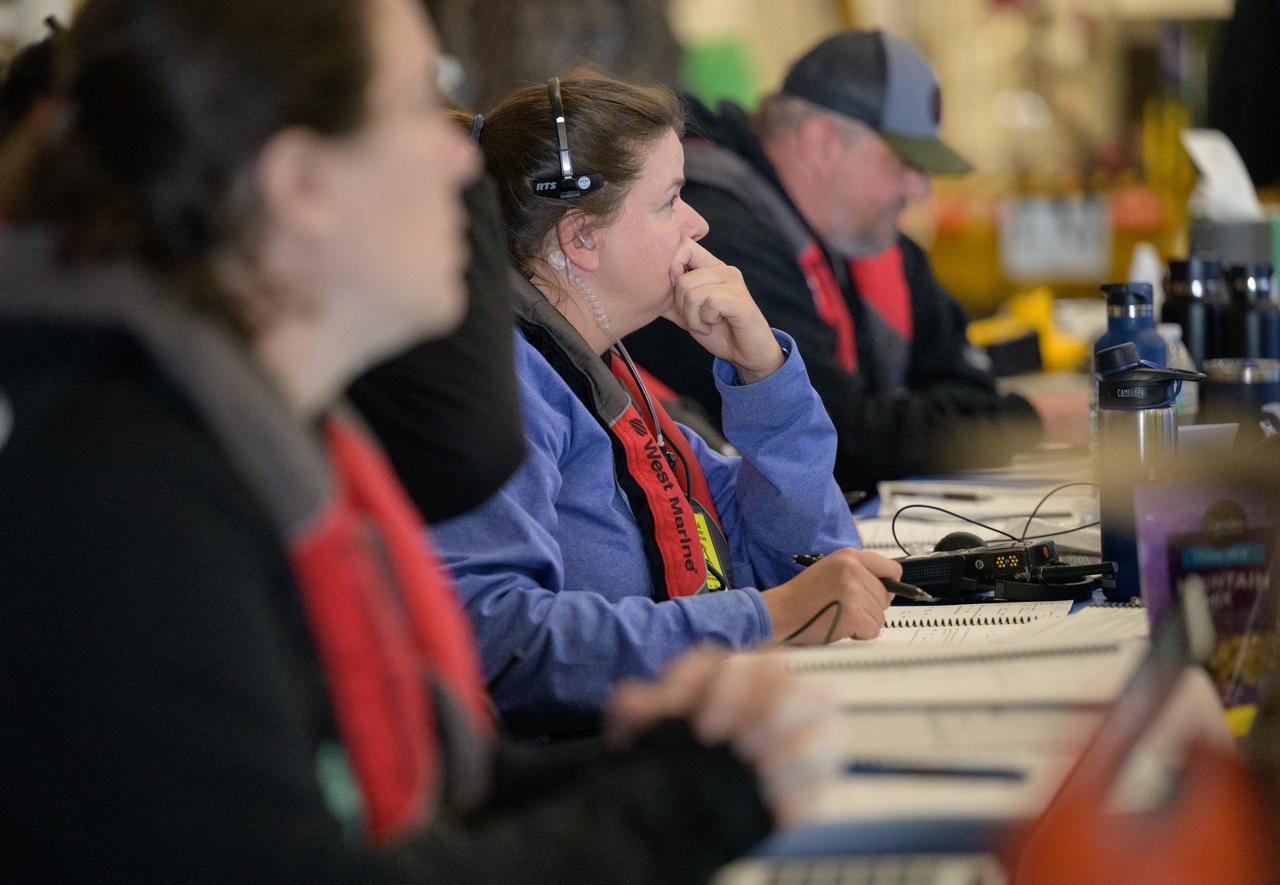 Members of NASA’s Landing and Recovery team are seen as they recover the Crew Module Test Article (CMTA), a full scale mockup of the Orion spacecraft, as teams  practice Artemis recovery operations during Underway Recovery Test-12 onboard USS Somerset off the coast of California, Saturday, March 29, 2025. During the test, NASA and Department of Defense teams are practicing to ensure recovery procedures are validated as NASA plans to send Artemis II around the Moon and splashdown in the Pacific Ocean.  Photo Credit: (NASA/Bill Ingalls)