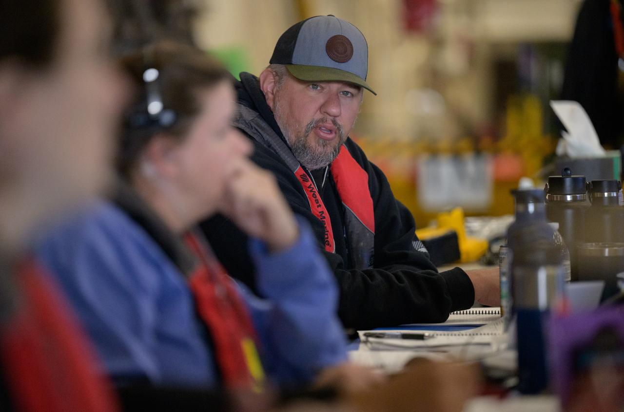 Members of NASA’s Landing and Recovery team are seen as they recover the Crew Module Test Article (CMTA), a full scale mockup of the Orion spacecraft, as teams  practice Artemis recovery operations during Underway Recovery Test-12 onboard USS Somerset off the coast of California, Saturday, March 29, 2025. During the test, NASA and Department of Defense teams are practicing to ensure recovery procedures are validated as NASA plans to send Artemis II around the Moon and splashdown in the Pacific Ocean.  Photo Credit: (NASA/Bill Ingalls)